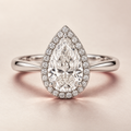 The Corveline Pear Halo Natural Diamond Ring