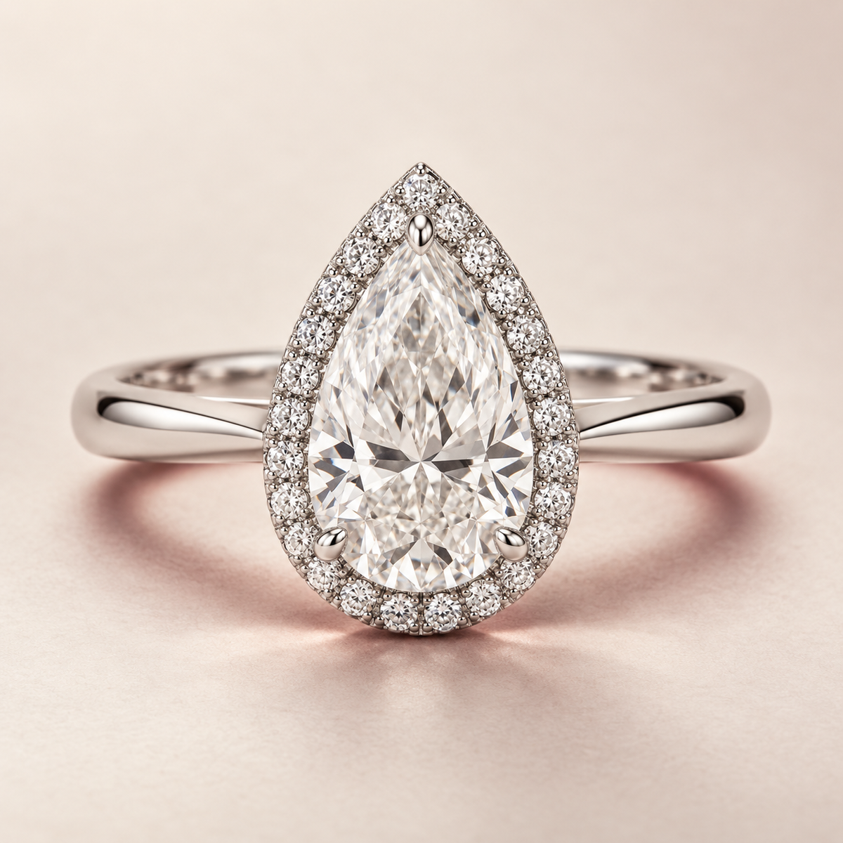 The Corveline Pear Halo Natural Diamond Ring